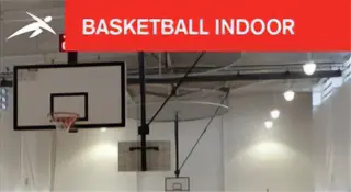 Indoor basketball facility with multiple roof mounted hoops and polished timber floor. A red banner at the top reads “BASKETBALL INDOOR” with HiTech’s logo.