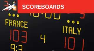 Close-up of an electronic scoreboard showing scores for both teams in a sporting match. A red banner at the top reads “SCOREBOARDS” with HiTech’s logo.